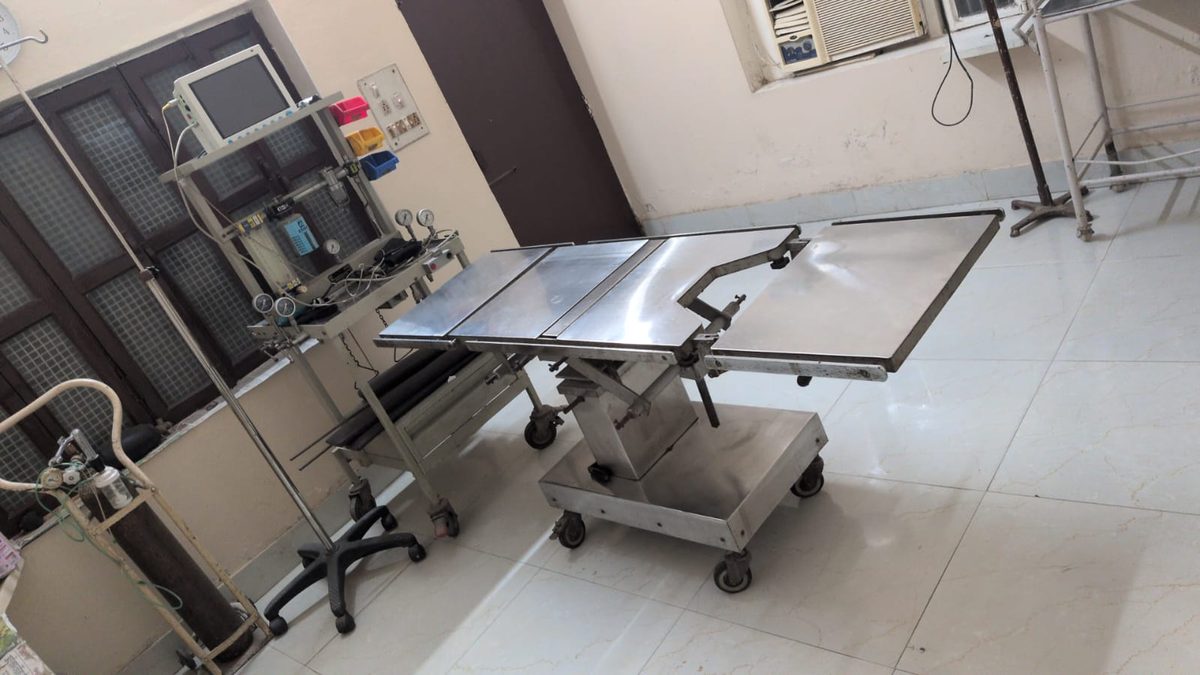Operation theatre with surgical equipment